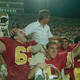 Philadelphia coach Jim Mora on the shoulders of some victorious USFL players, 1984.